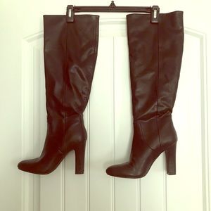 Black leather knee high boot heels
